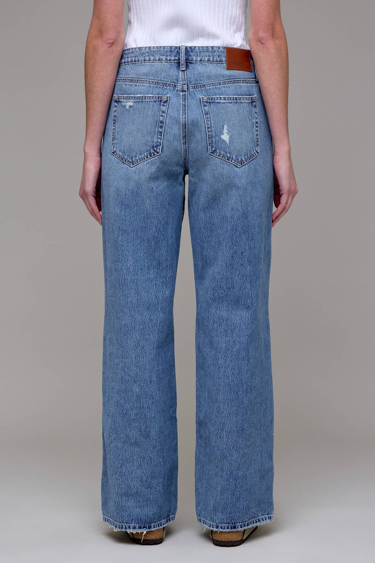 Light blue Logan Classic Relaxed Dad Jeans by Hidden Jeans, shown flat with front pockets and relaxed fit detailing.