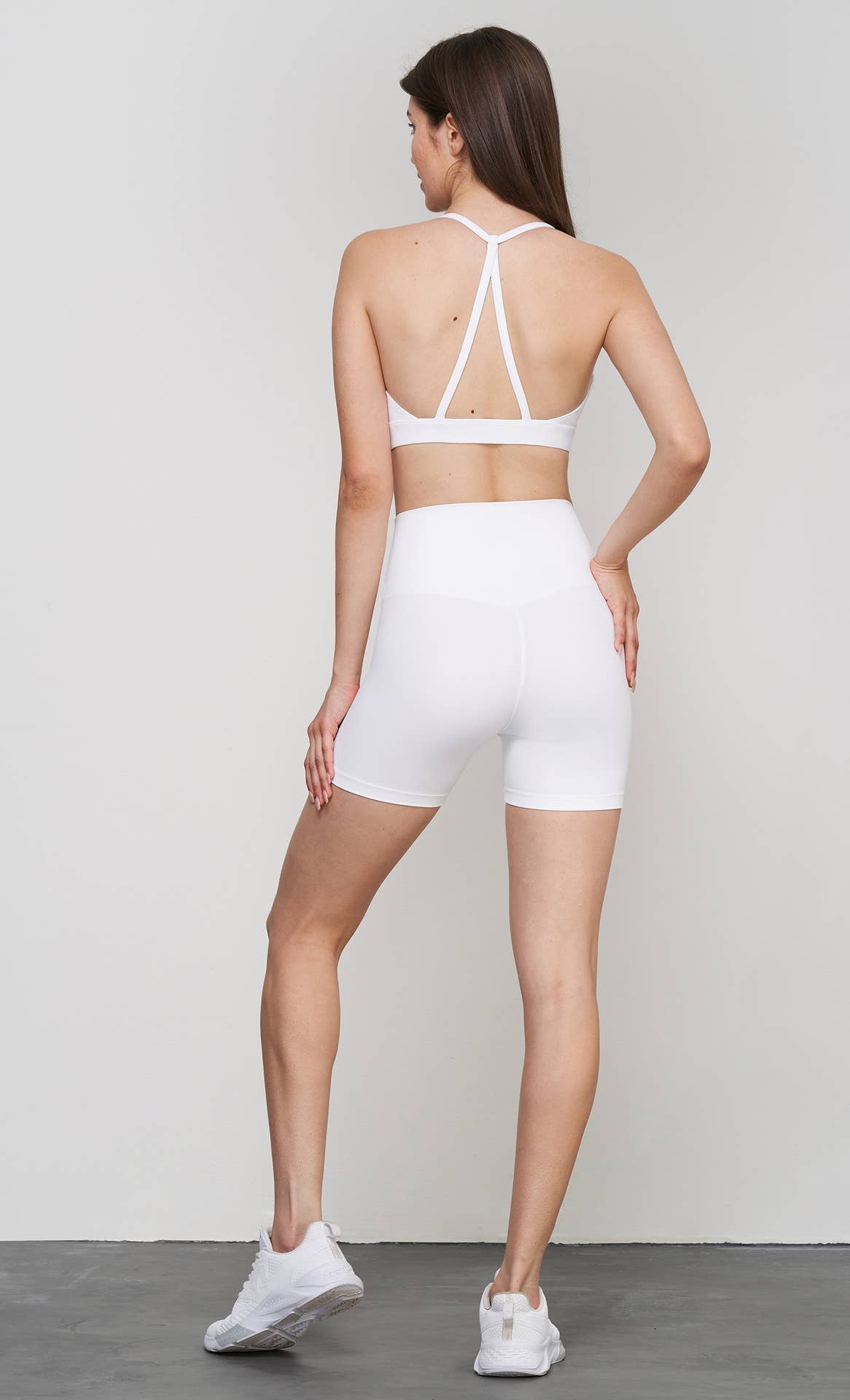 Luna 2-piece sports bra and shorts yoga set by 91thelabel, ideal for Pilates and workout sessions, shown on a model.