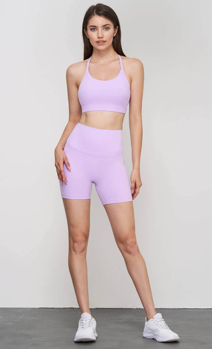 Luna 2-piece sports bra and shorts yoga set by 91thelabel, perfect for Pilates and workout sessions, in breathable fabric.