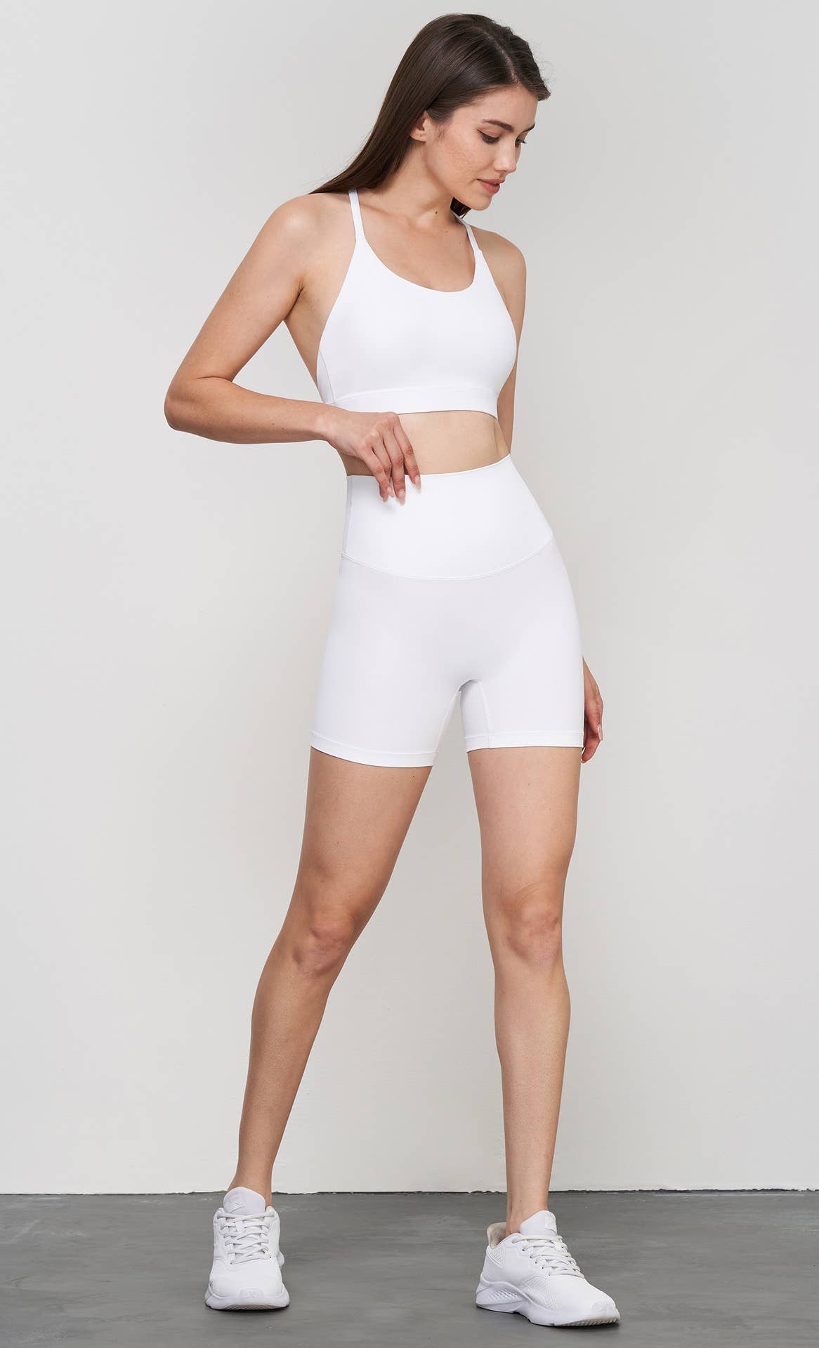 Luna 2-piece sports bra and shorts yoga set by 91thelabel, ideal for Pilates and workout sessions, shown on a model.
