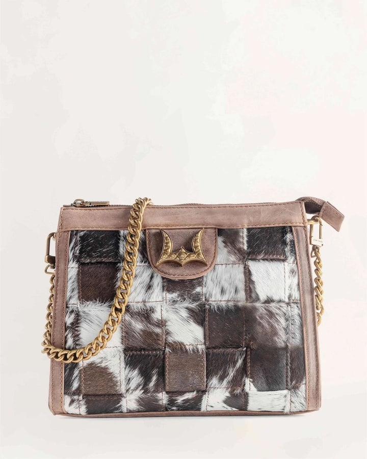 Loyal West LW Scrappy Medium Chainbag with denim and leather patchwork, chain strap, and colorful patch accents.