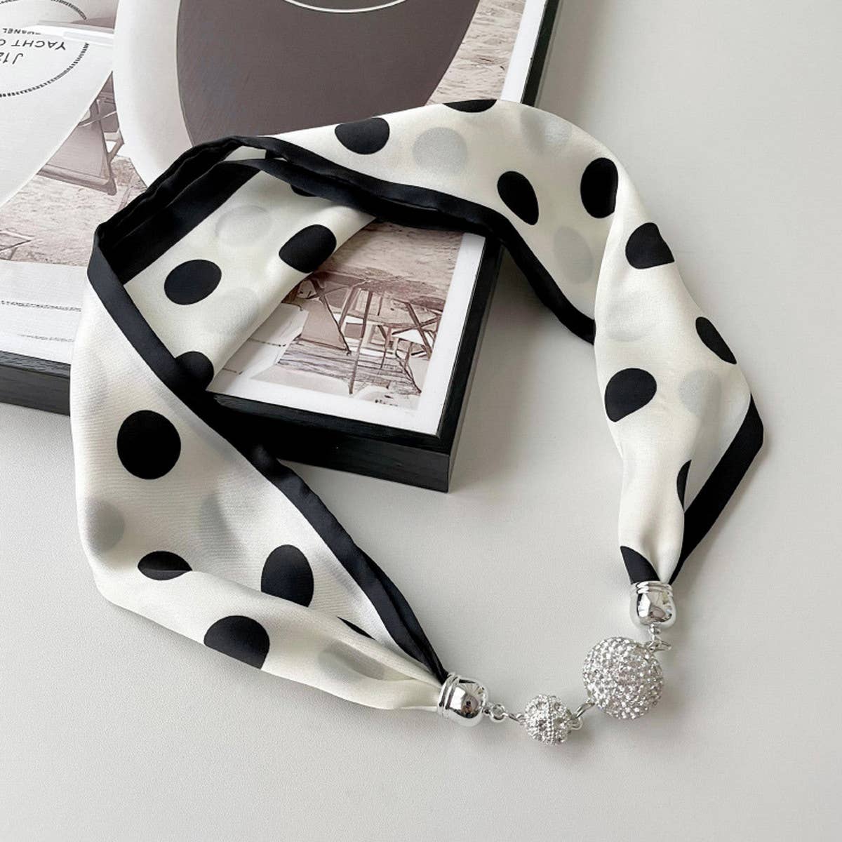 Elegant ACCITY magnetic silk scarf necklace wrapped around a neck, showcasing its stylish and versatile accessory design.