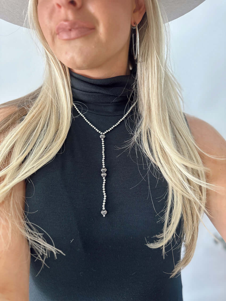 18-inch 18K gold plated beaded Y necklace with 5-inch tail, available in white and yellow gold, by West & Co. jewelry.