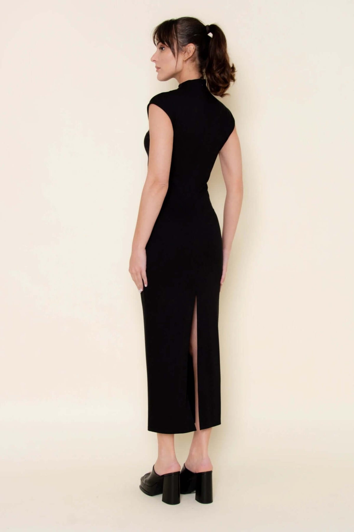 Fore Collection mesh side slit maxi dress featuring a flowing design and sheer mesh accents, perfect for elegant occasions.