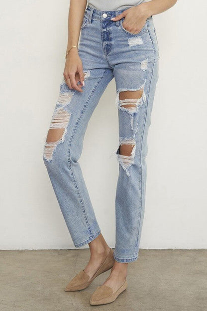 Light wash mid-waisted distressed boyfriend straight-leg jeans for women by Insane Gene, featuring ripped denim and casual style.