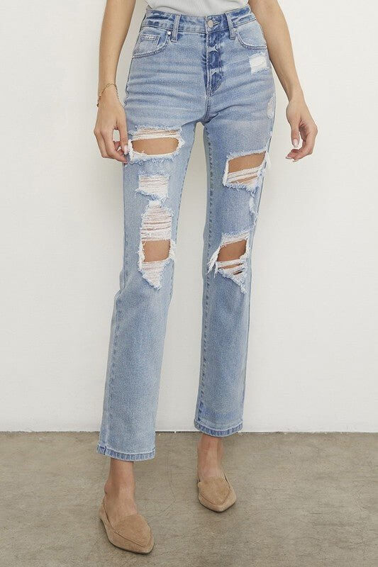 Light wash distressed boyfriend straight leg jeans for women by Insane Gene, featuring mid-waist and ripped denim design.