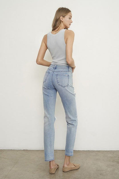 Light wash distressed boyfriend straight leg jeans for women by Insane Gene, featuring mid-waist and ripped denim style.