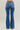 Midrise Judy Blue distressed trouser flare with button fly and frayed details, showcasing a trendy casual denim style.