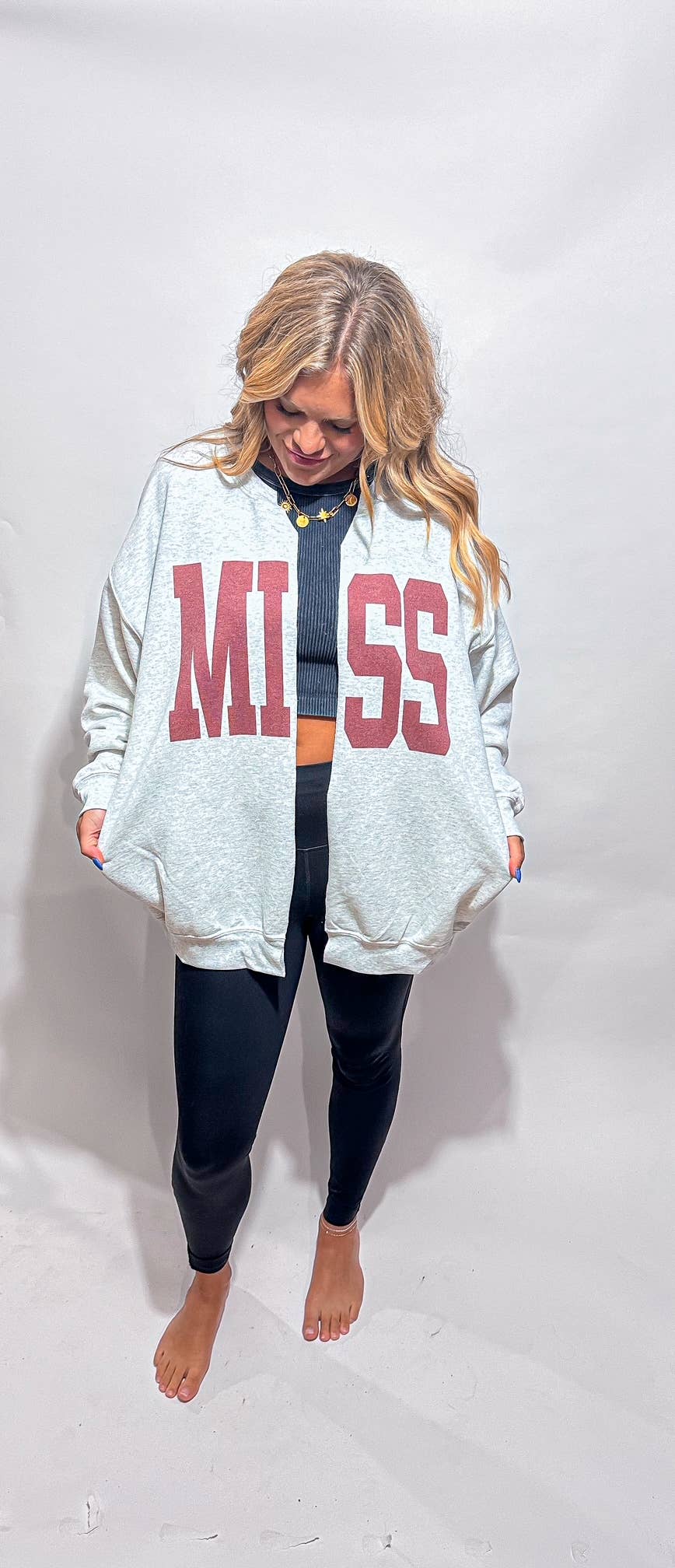 Wicker Road Boutique MISS STATE cardigan in soft knit fabric, featuring a cozy, button-up design with a ribbed collar and cuffs.