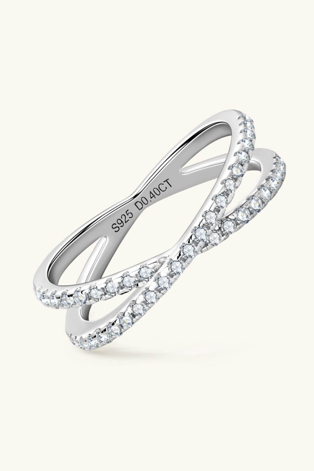 Sterling silver Moissanite crisscross ring with infinity design and 0.40 CT stones, jewelry accessory with elegant sparkle.