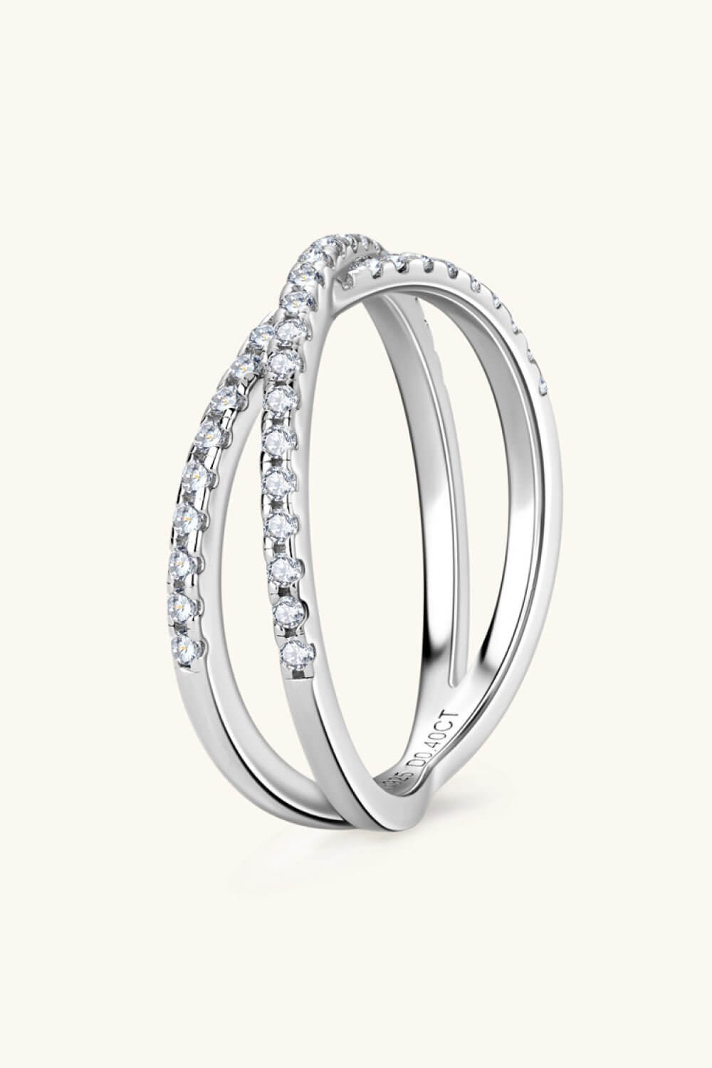 Sterling silver Moissanite crisscross infinity ring with 0.40 CT stones, elegant jewelry accessory by Cowgirl Charm.