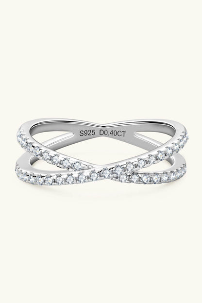 Moissanite crisscross ring with 925 sterling silver infinity band and 0.40 CT stones, designed as jewelry accessories.