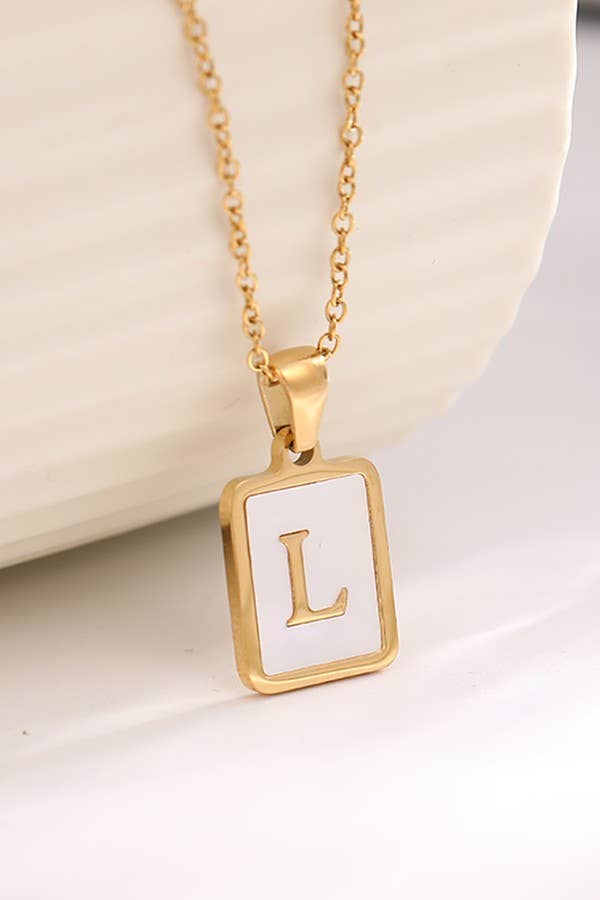Stainless steel tarnish-free initial necklace from JOSSLYN by Wall to Wall, featuring a sleek, minimalist pendant on a delicate chain.