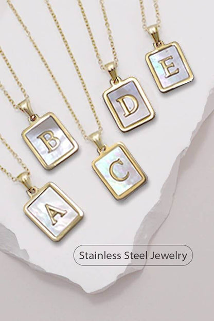 Stylish stainless steel initial necklace by JOSSLYN, tarnish-free jewelry accessory with a sleek, modern design.