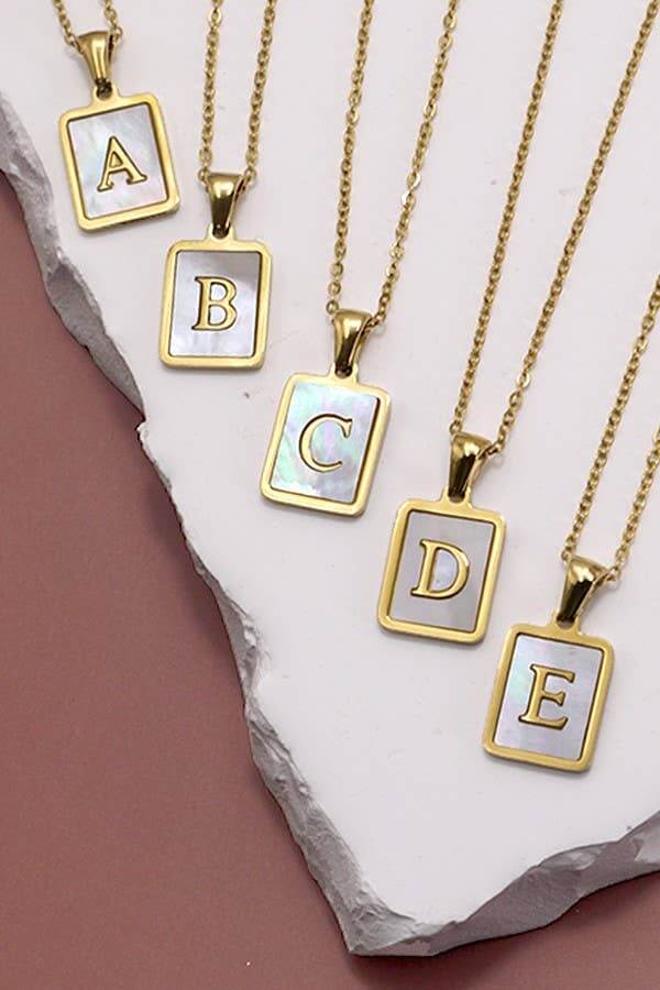 Stainless steel tarnish-free initial necklace by JOSSLYN, featuring a sleek, personalized jewelry design for stylish accessories.
