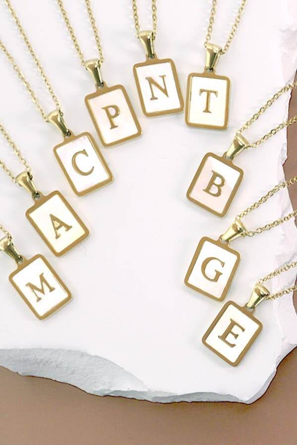 Stainless steel tarnish-free necklace with initial pendant by JOSSLYN, featuring a sleek, minimalist jewelry design.