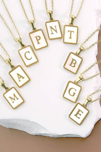 Stainless steel tarnish-free necklace with initial pendant by JOSSLYN, featuring a sleek, minimalist jewelry design.