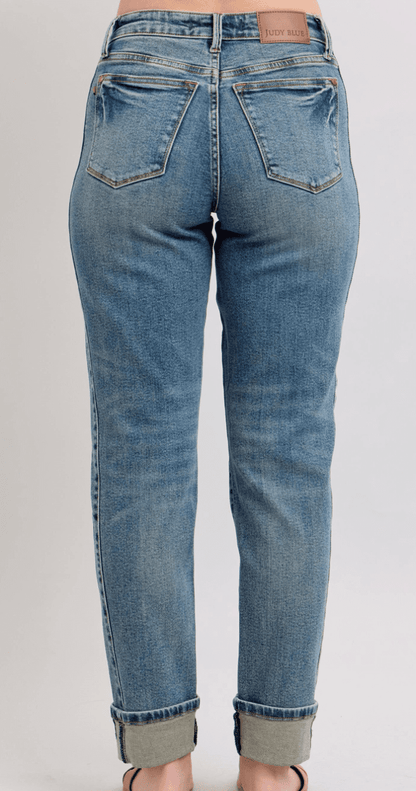 Mr. Vintage Wash Boyfriend Jeans by Judy Blue featuring side seam panel and double roll cuffs, styled on a model.