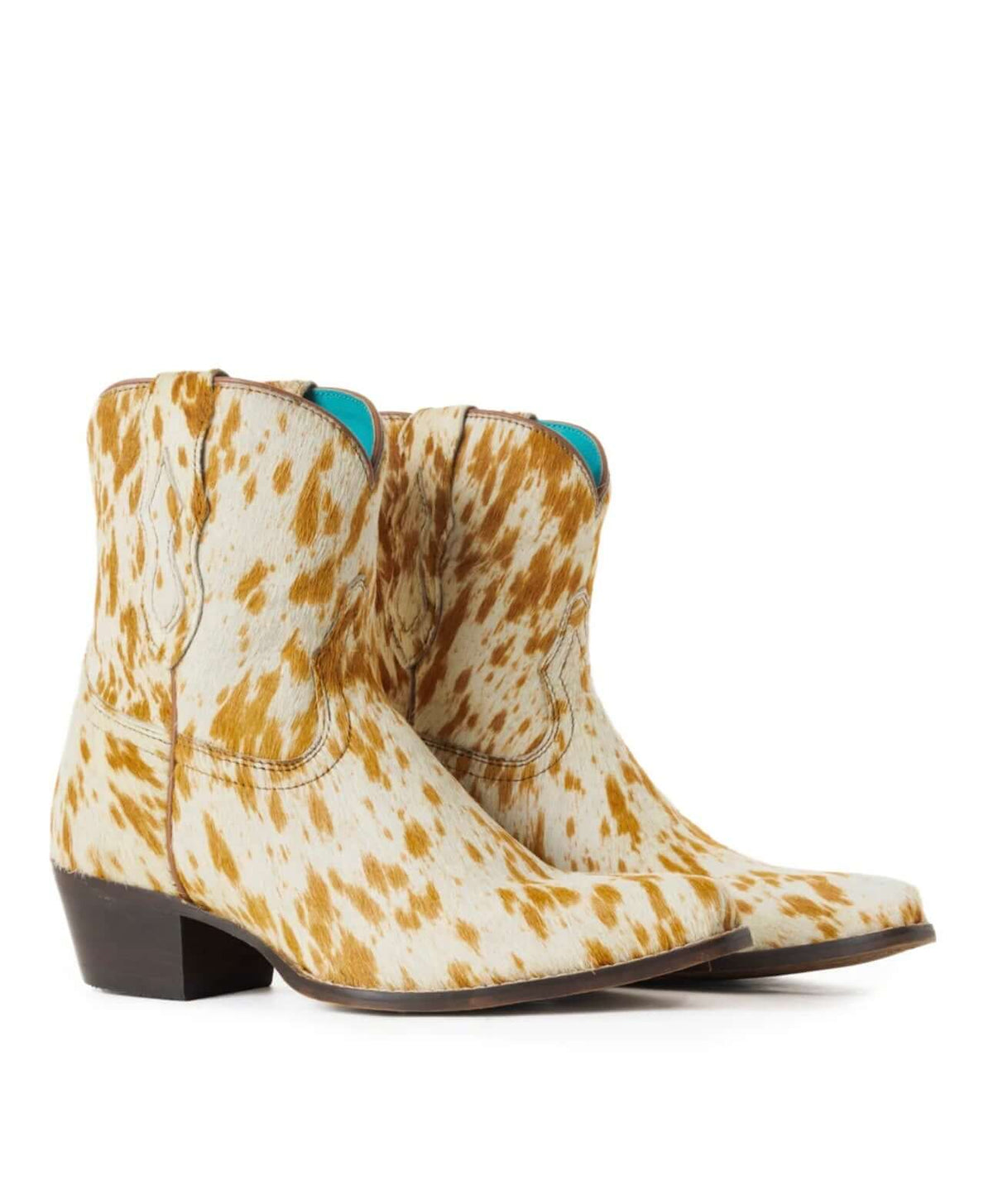 Myra Cowdie Western Hairon Leather Booties by Cowgirl Charm featuring pointed toes and rugged leather construction.
