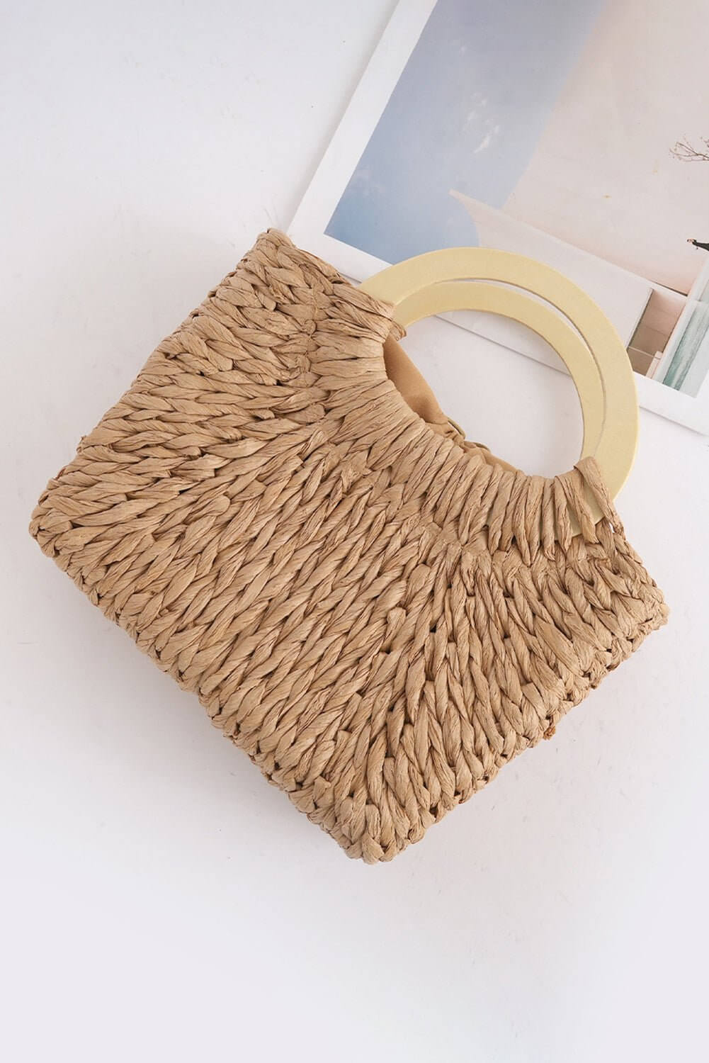 Cowgirl Charm Natural Charm woven handbag with leather straps and intricate weave design, perfect for casual or boho style.