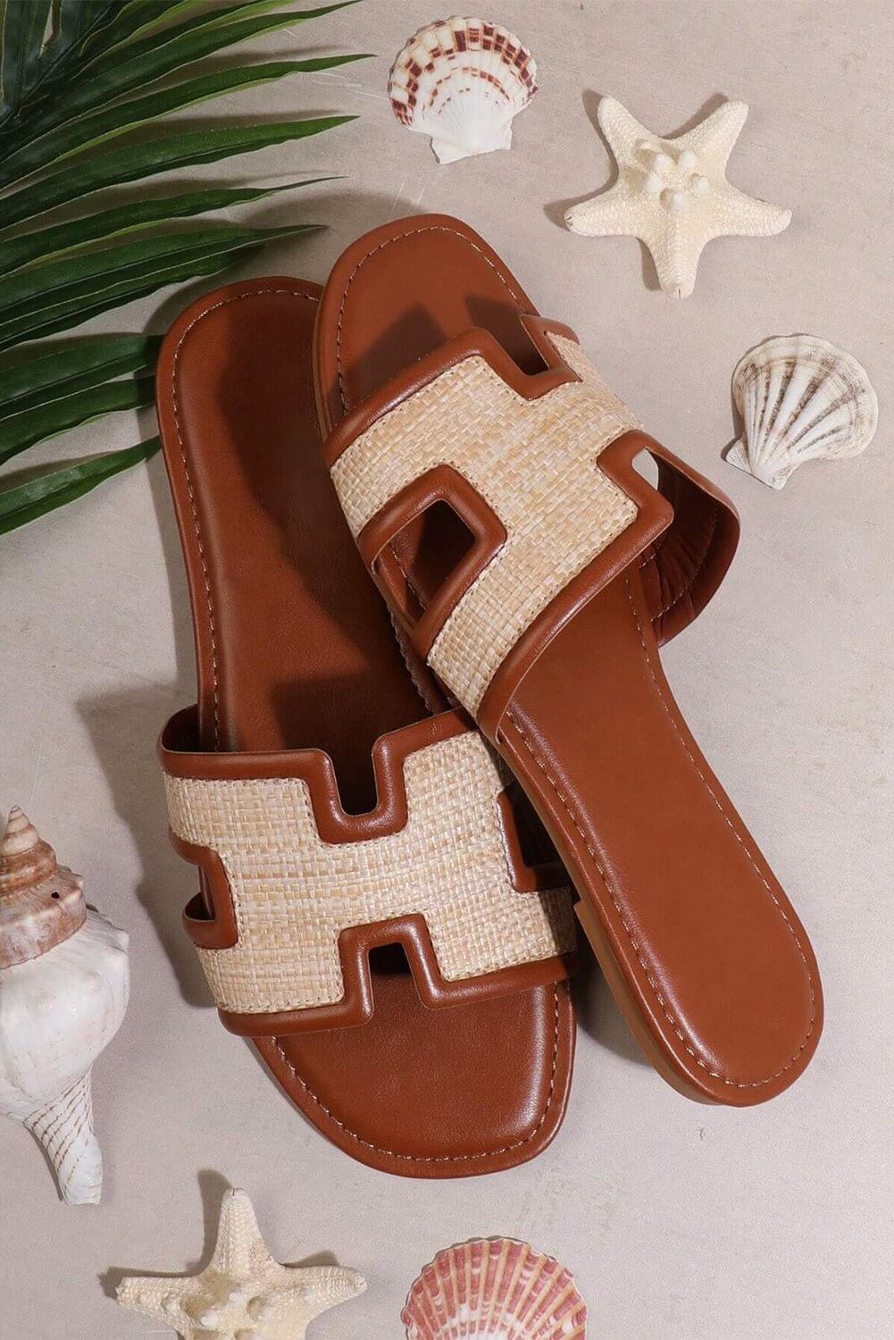 Natural woven slide sandals by Cowgirl Charm, casual summer flats with open toe and comfortable slip-on design.