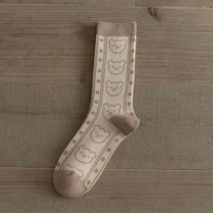 Pair of ACCITY women's autumn cotton mid-calf socks with cozy knit texture and neutral color, perfect for casual wear.