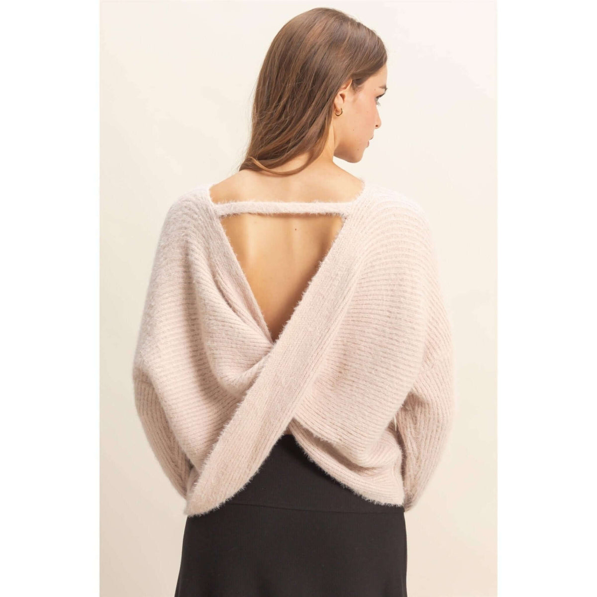 HYFVE oversized fuzzy sweater with back twist detail, cozy knit, long sleeves, and relaxed fit for casual wear.