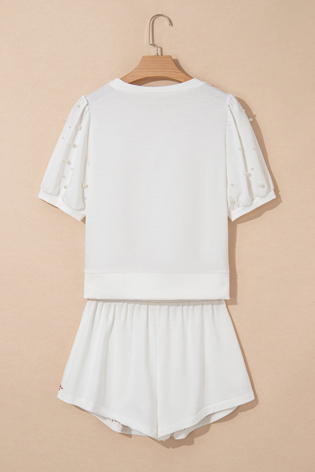 White pearl puff sleeve lounge set by Cowgirl Charm, embroidered two-piece outfit with cozy, stylish design.