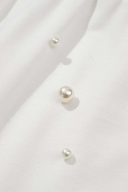 White embroidered Pearl Puff Sleeve Lounge Set by Cowgirl Charm, two-piece casual outfit with puff sleeves and relaxed fit.