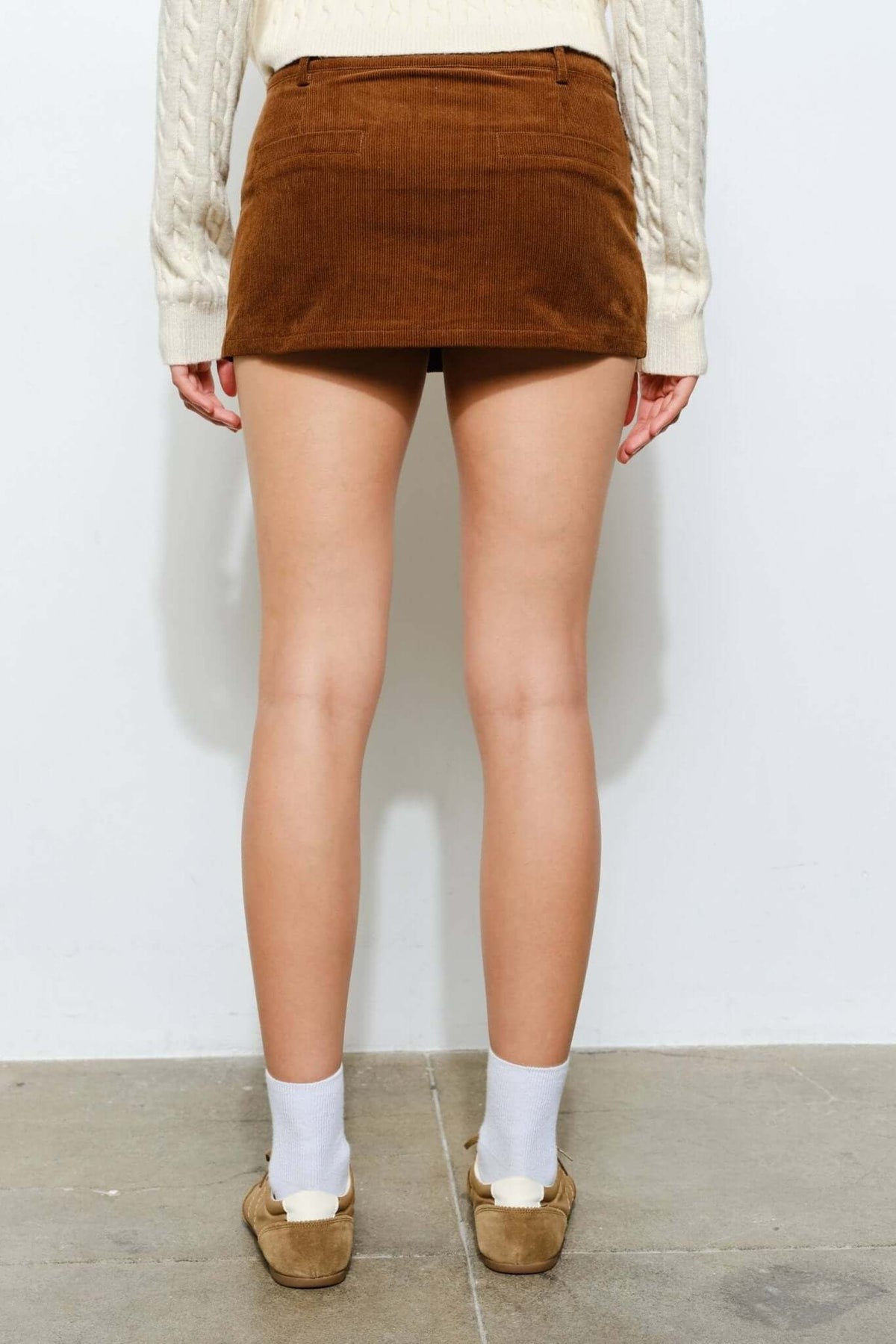 Pretty Garbage Peyton corduroy skort in casual retro style, featuring a trendy design and comfortable fit.