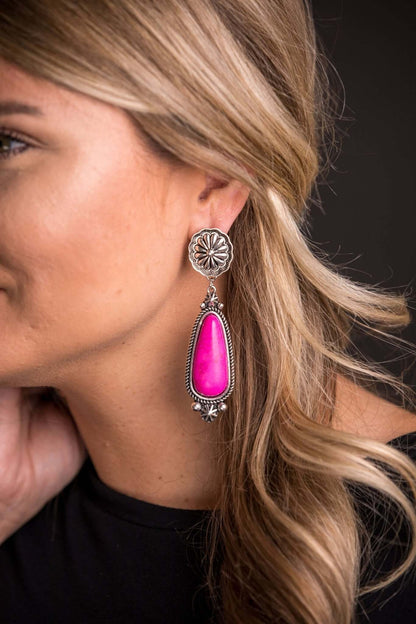 Pink statement earring on silver concho post from West & Co., featuring bold pink design and silver-tone detailing.