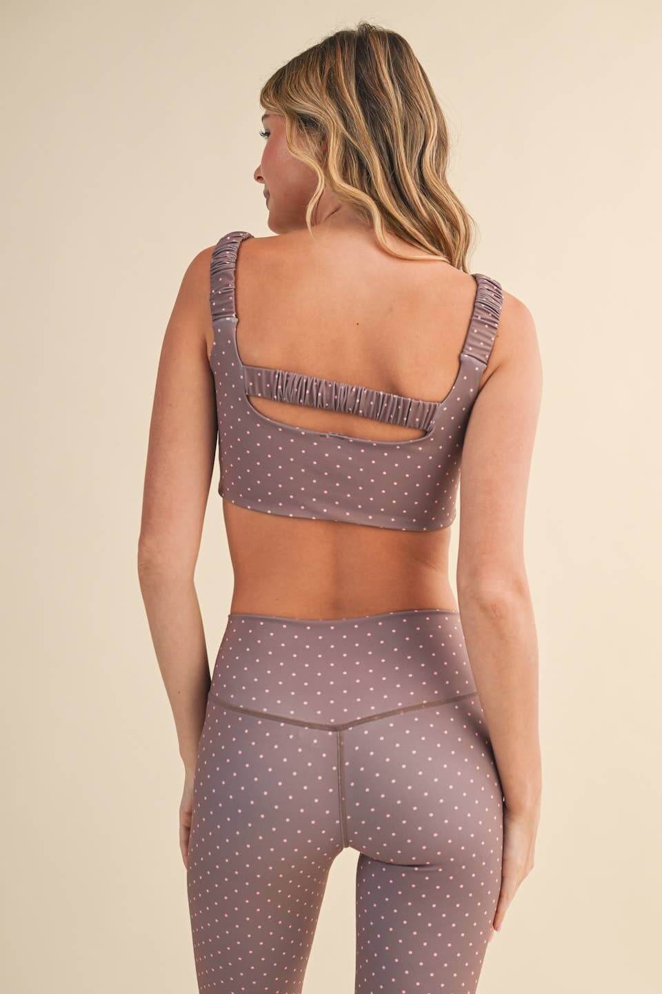 Polka dot print ruched bra top by Kimberly C, featuring adjustable straps and a fitted, stylish design for casual wear.
