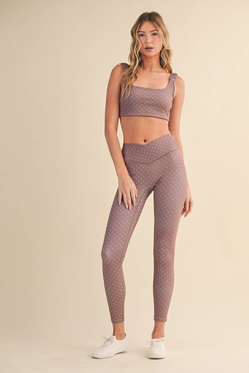 Polka dot print ruched bra top from Kimberly C featuring a fitted design and adjustable straps, perfect for casual wear.