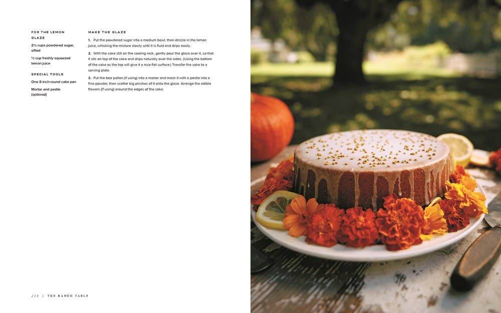 Open book titled "The Ranch Table" by Elizabeth Poett, showcasing rustic farm-to-table recipes and culinary inspiration.