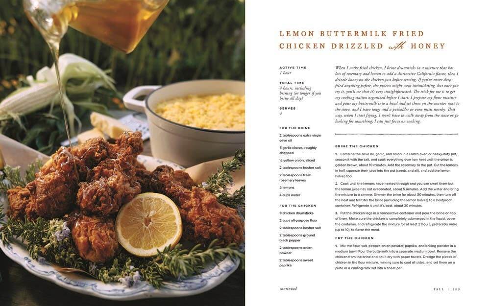 Open book titled "The Ranch Table" by Elizabeth Poett, featuring rustic recipes and farm-to-table dining concepts.