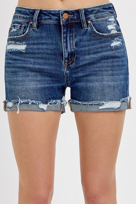 Risen women's mid-rise distressed denim shorts with rolled cuffs, casual and stylish for warm weather.
