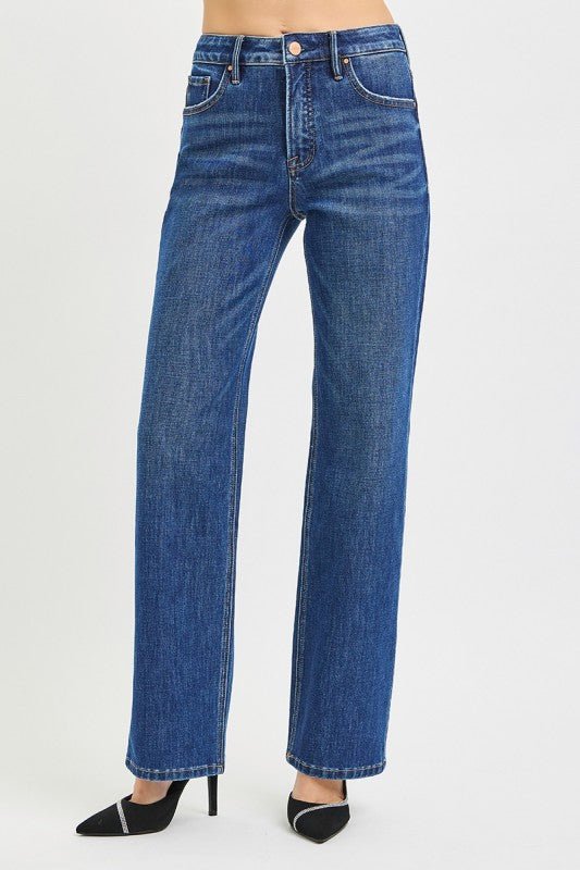 Risen Tummy Control 4-way stretch high-rise straight jeans showing a close-up of the fit and denim texture.