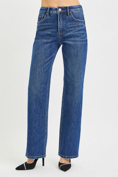 Risen Tummy Control 4-way stretch high-rise straight jeans showing a close-up of the fit and denim texture.