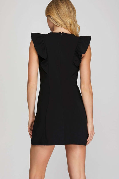 She and Sky ruffle sleeve heavy knit mini dress showcasing bold, sleek, and feminine style with textured fabric and fashionable design.