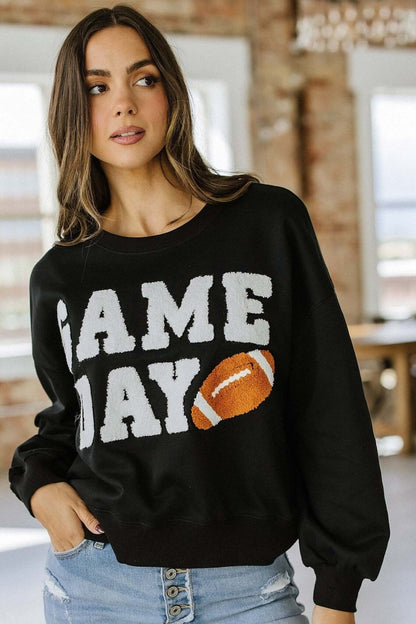 Liam & Company Ruth Game Day Pullover featuring a cozy design with team-themed graphics and a comfortable fit.