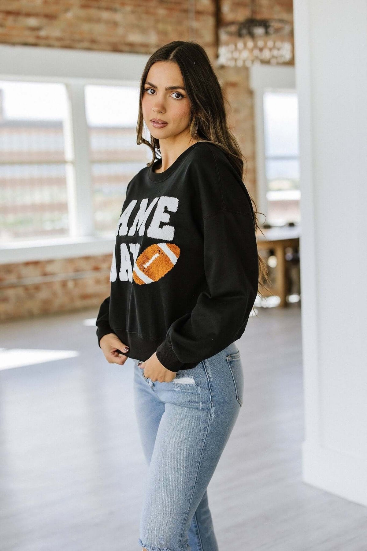 Liam & Company Ruth Game Day Pullover featuring a cozy knit fabric and team-inspired design, perfect for showing team spirit.