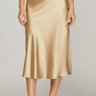 She and Sky Luxe high-waist satin midi skirt in silky fabric, showcasing smooth texture and elegant drape.