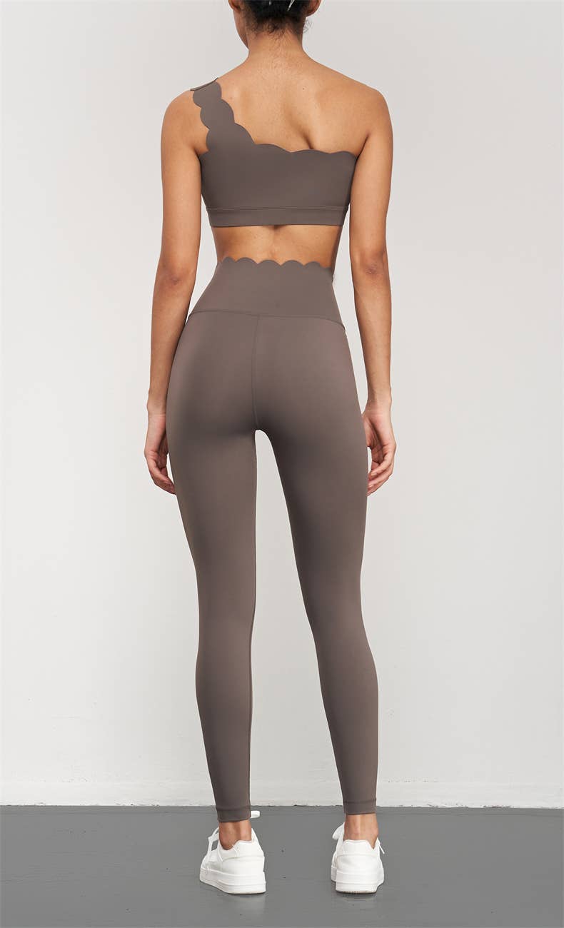 High-waist scallop top activewear leggings from 91thelabel featuring a stylish scalloped waistband and stretchy fabric.