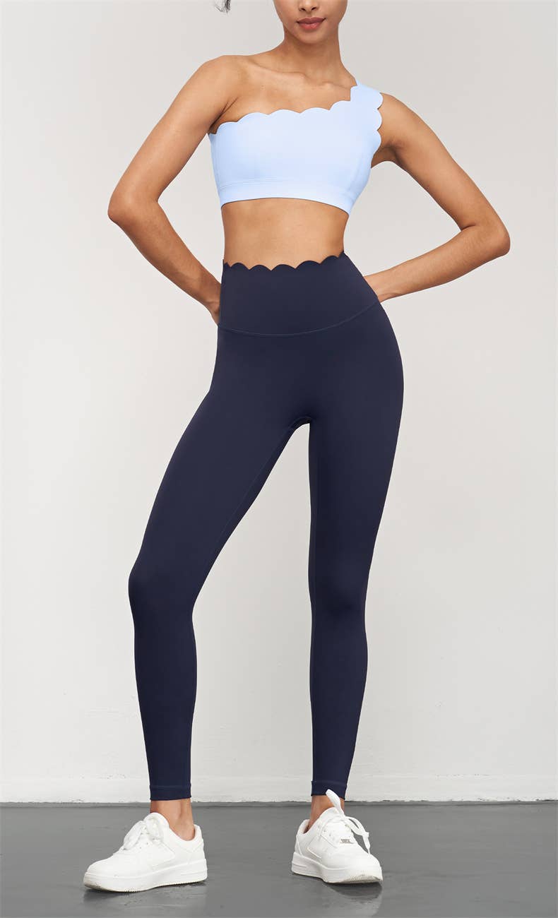 High-waist scallop top activewear leggings by 91thelabel, featuring a stylish scalloped waistband and a snug fit for workout comfort.
