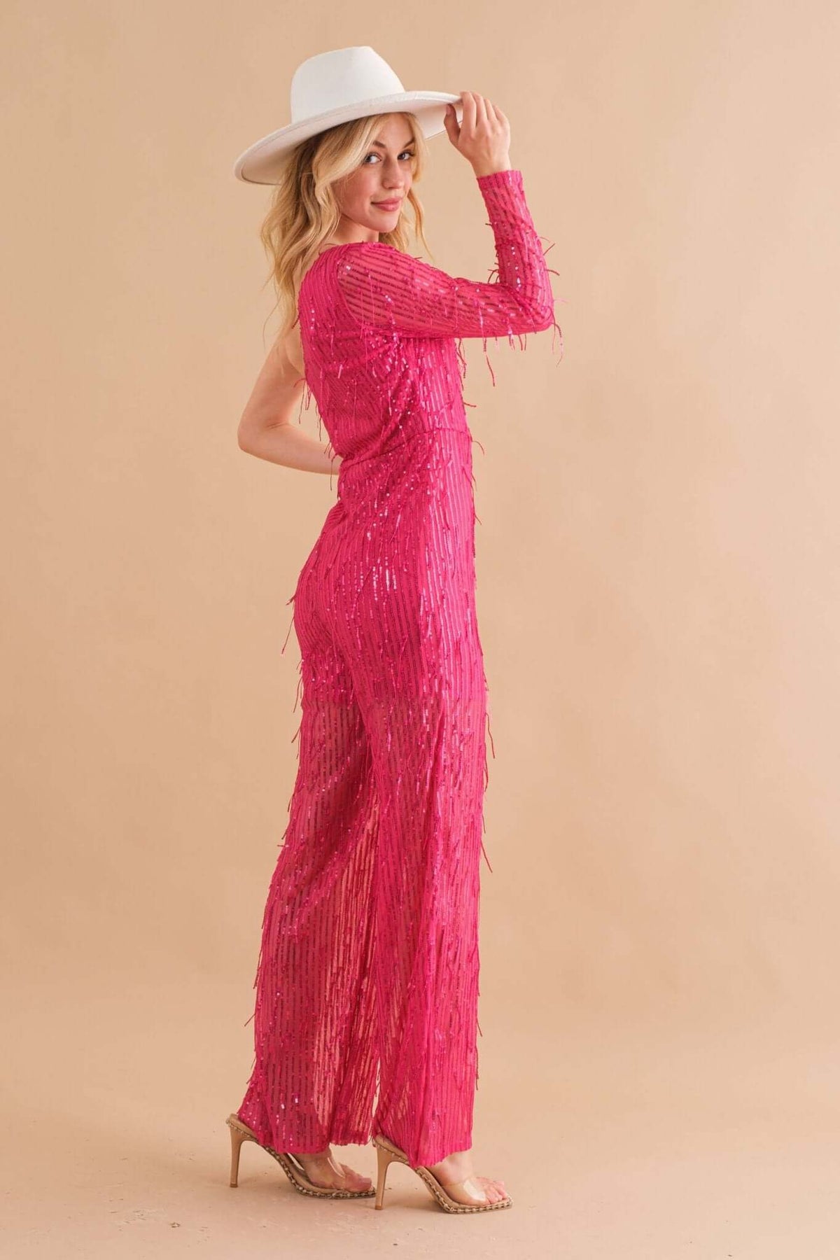 Blue B sequin fringe one-shoulder jumpsuit with stylish embellishments, featuring a sleek, elegant design for evening wear.