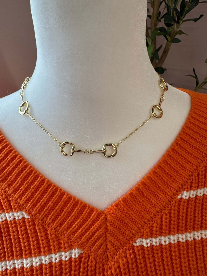 Gold Cowgirl Charm short link necklace with a delicate chain and stylish design, perfect for layered jewelry looks.