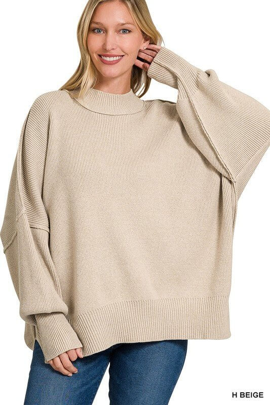 Zenana side slit oversized sweater featuring a relaxed fit and side slits, perfect for casual and cozy winter looks.