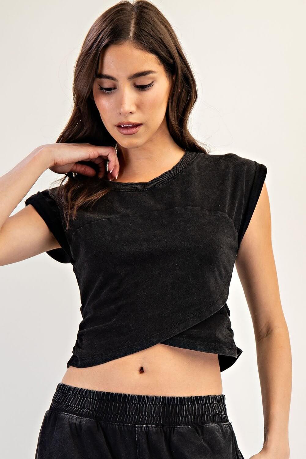 Black sleeveless crop top from ee:some loungewear set, featuring a fitted design and soft fabric for comfortable casual wear.