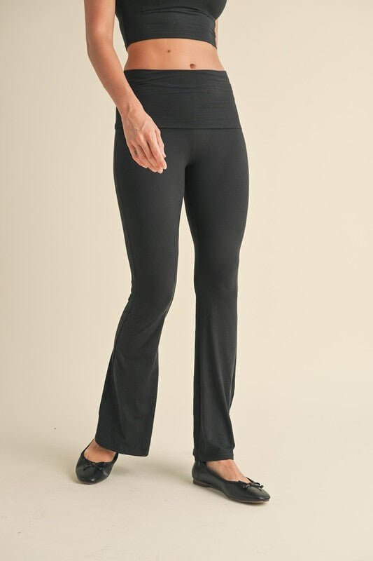 Soft-knit flare leggings from KIMBERLY C, stylish activewear with a comfortable fit and flare design, ideal for workouts or casual wear.