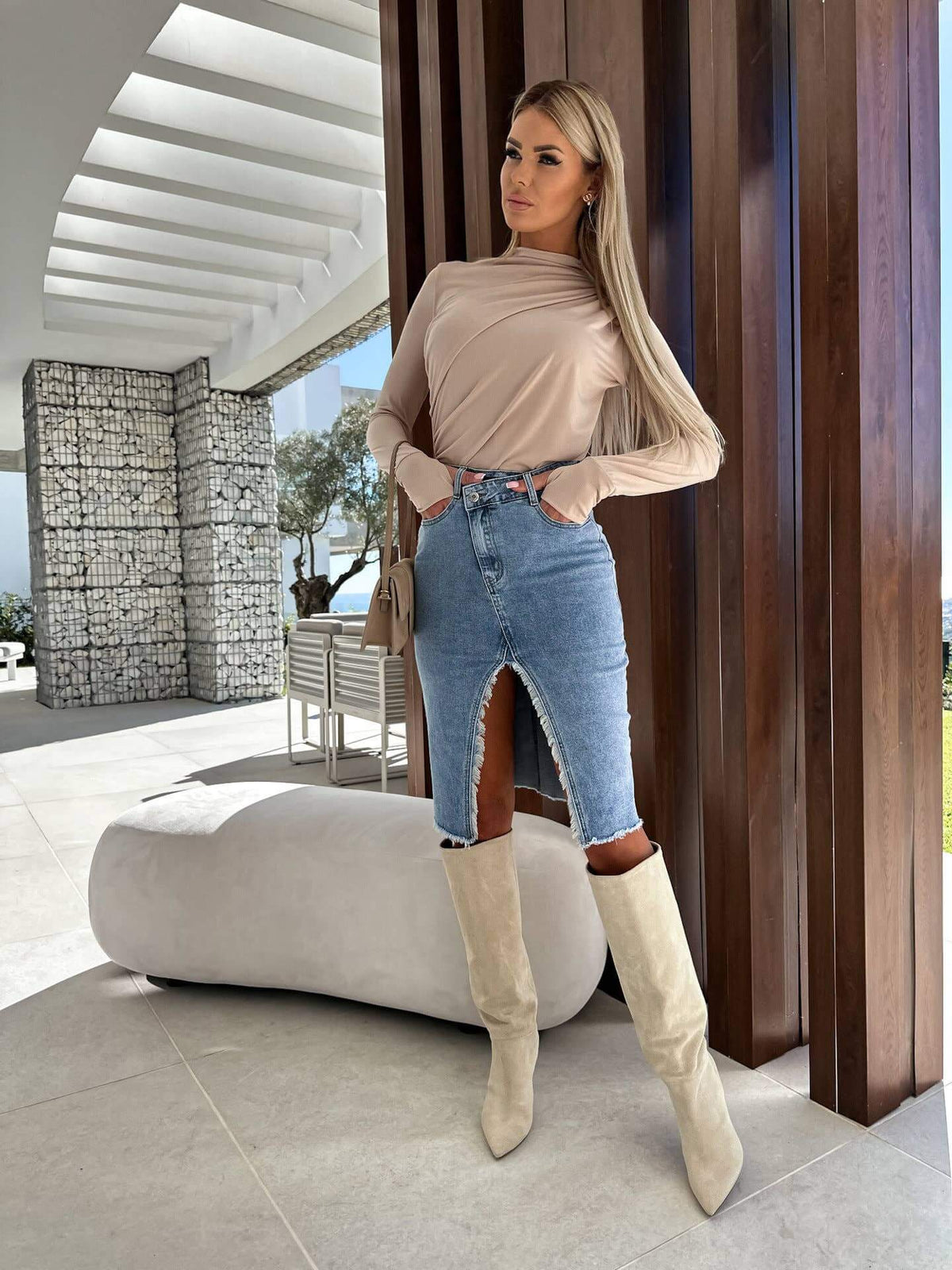 Hope & Sunshine solid color denim split skirt showing a high-waisted design with front slit and classic denim texture.